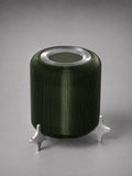 AERO ribbed olive green designer table lamp by Natalia Design Co. shown from above, featuring a translucent PETG diffuser and sculptural satin aluminium feet in an industrial contemporary design.