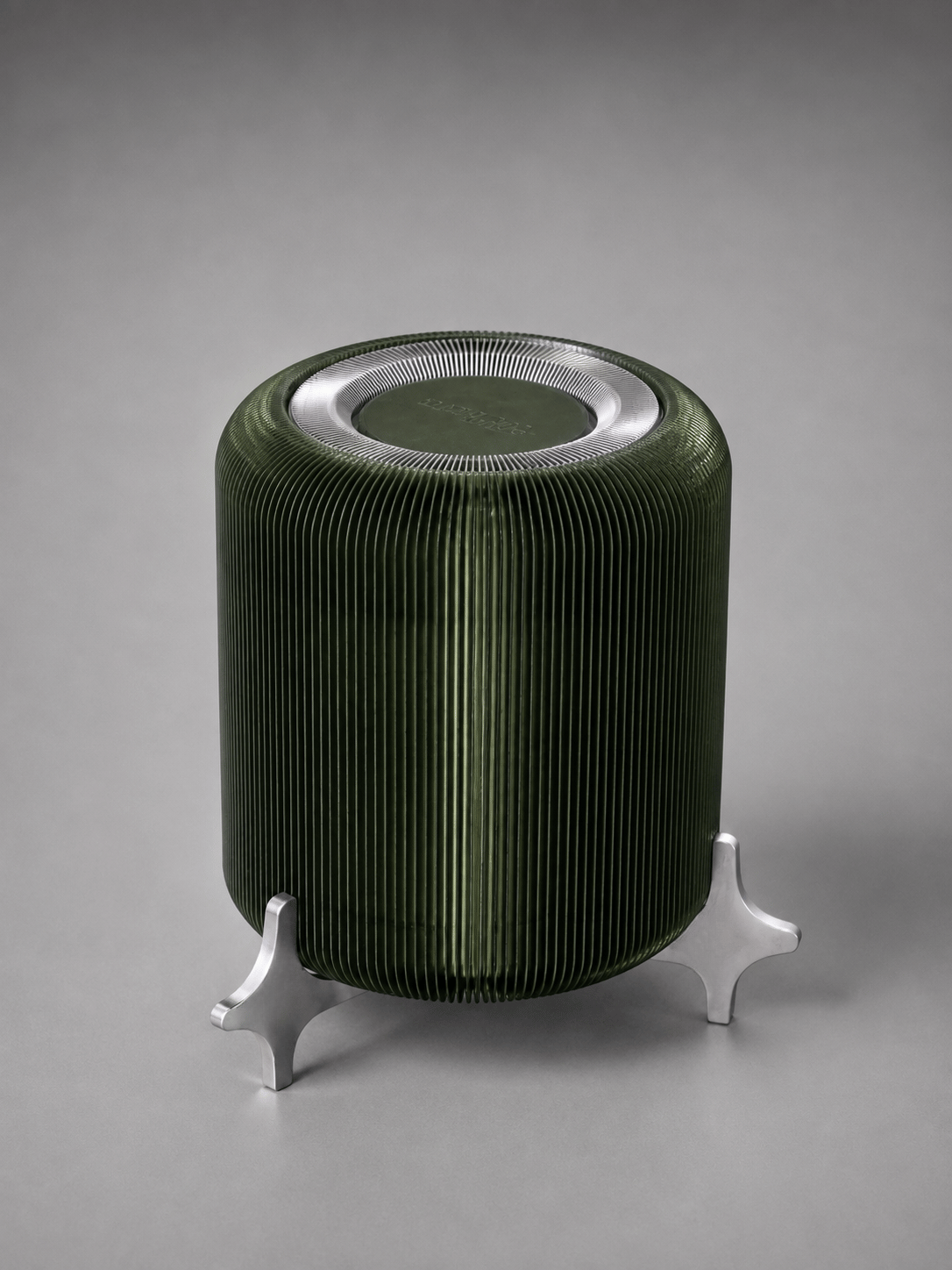 AERO ribbed olive green designer table lamp by Natalia Design Co. shown from above, featuring a translucent PETG diffuser and sculptural satin aluminium feet in an industrial contemporary design.