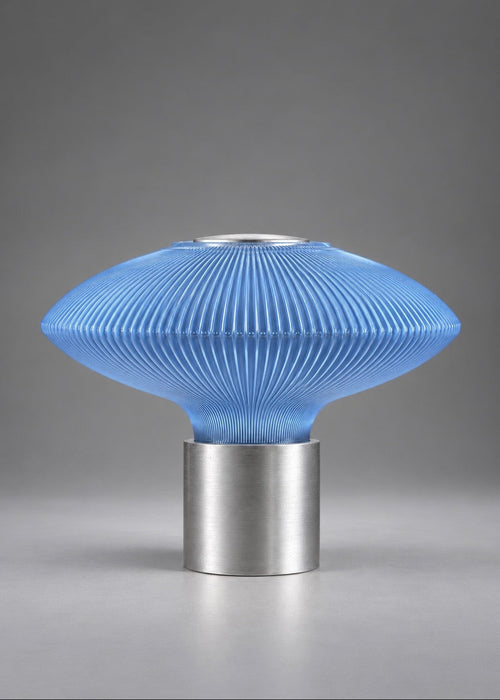COSMOS futuristic designer table lamp featuring a translucent blue PETG diffuser with custom 3D printed texture and a brushed aluminium base, inspired by space objects and orbital forms.